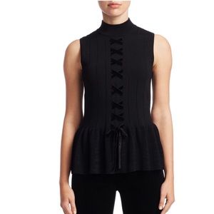 Scripted sleeveless lace-up peplum sweater